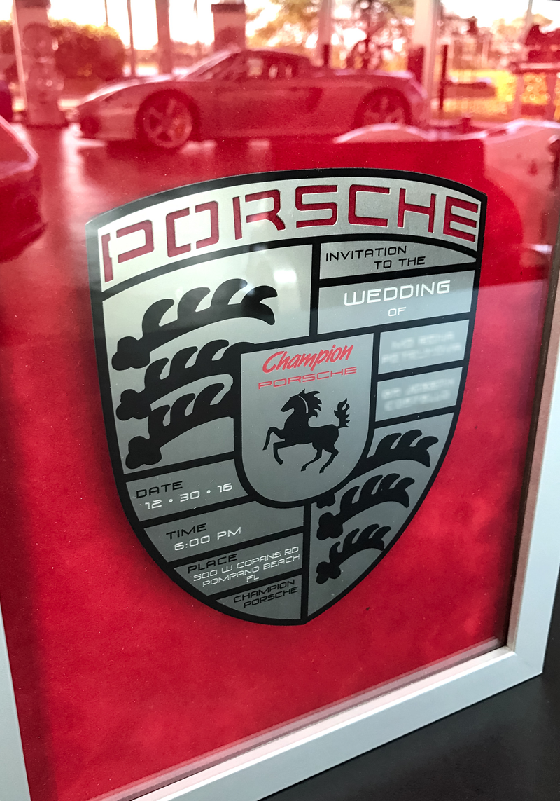 Illustration for article titled This Couple Topped Your Wildest Dreams By Getting Married In A Porsche Showroom